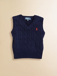 The essential sweater vest is a handsome layer rendered in durable cable-knit cotton.V-neckSleevelessPullover styleCottonMachine washImported The essential sweater vest is a handsome layer rendered in durable cable-knit cotton.V-neckSleevelessPullover styleCottonMachine washImported