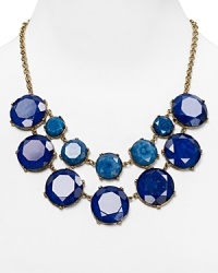 More is major on this Aqua necklace, which features a colorful cascade of cabochon stones. It's our favorite new season layering piece. More is major on this Aqua necklace, which features a colorful cascade of cabochon stones. It's our favorite new season layering piece.