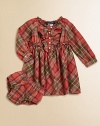 A festive plaid pattern graces this adorable button-front shirt dress, featuring a sweet ruffle trim and flared hem.Ruffled round necklineLong sleeves with barrel cuffsRuffled button-frontFlared hemCottonMachine washImported Please note: Number of buttons may vary depending on size ordered. 