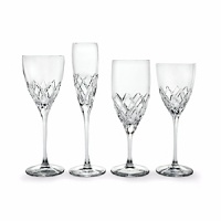Kate Spade and Lenox join together to bring ease, elegance and understated wit to the table. Downing Cut features traditional diamond shaped cuts on long elegant stems and coordinates beautifully with any of the kate spade fine china patterns. Shown from left to right: goblet, flute, iced beverage, wine glass.