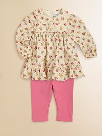 This pretty set set pairs a frilly, floral tunic with matching leggings for a charming ensemble. Tunic Peter Pan collarLong sleevesBack buttonsGathered yokeRuffled hem Leggings Elastic waistbandCottonMachine washImported Please note: Number of buttons may vary depending on size ordered. 