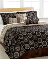 Under the sun. A modern sunburst design lends sleek sophistication to the bedroom in this jacquard woven Sunburst comforter set, featuring a dramatic, earthy palette. Reverses to an allover dot pattern in coordinating hues. Finished with decorative twisted cord and tassel accents for a touch of charm. Under the sun. A modern sunburst design lends sleek sophistication to the bedroom in this jacquard woven Sunburst comforter set, featuring a dramatic, earthy palette. Reverses to an allover dot pattern in coordinating hues. Finished with decorative twisted cord and tassel accents for a touch of charm.