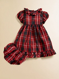 A party-ready dress features all the right details, including a classic plaid pattern and pretty ruffles for a festive look.Ruffle-trimmed crewneckShort puff sleevesBack buttonsEmpire waist with velvet sash and jeweled buckle claspFully linedCottonMachine washImported Please note: Number of buttons may vary depending on size ordered. A party-ready dress features all the right details, including a classic plaid pattern and pretty ruffles for a festive look.Ruffle-trimmed crewneckShort puff sleevesBack buttonsEmpire waist with velvet sash and jeweled buckle claspFully linedCottonMachine washImported Please note: Number of buttons may vary depending on size ordered.
