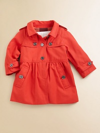 A girlie version of the classic trench that is at the heart of Burberry, in pure cotton with feminine details.Shirt-style collarShoulder epaulettesDouble front button gunflapsButton placketLong dolman sleeves with button tabs at cuffsHigh gathered waistAngled front button pocketsBack half beltInverted back center pleatCheck liningCottonDry cleanImported Please note: Number of buttons may vary depending on size ordered. A girlie version of the classic trench that is at the heart of Burberry, in pure cotton with feminine details.Shirt-style collarShoulder epaulettesDouble front button gunflapsButton placketLong dolman sleeves with button tabs at cuffsHigh gathered waistAngled front button pocketsBack half beltInverted back center pleatCheck liningCottonDry cleanImported Please note: Number of buttons may vary depending on size ordered.