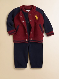 A soft, cozy three-piece set includes an athletic fleece jacket, a cotton jersey Henley bodysuit and comfortable, varsity-inspired sweatpants. Bodysuit CrewneckLong sleevesButton-frontBottom snaps Jacket CrewneckLong sleevesFront snapsAngled welt hand pockets Pants Elastic waistband60% cotton/40% polyesterMachine washImported Please note: Number of buttons may vary depending on size ordered. A soft, cozy three-piece set includes an athletic fleece jacket, a cotton jersey Henley bodysuit and comfortable, varsity-inspired sweatpants. Bodysuit CrewneckLong sleevesButton-frontBottom snaps Jacket CrewneckLong sleevesFront snapsAngled welt hand pockets Pants Elastic waistband60% cotton/40% polyesterMachine washImported Please note: Number of buttons may vary depending on size ordered.