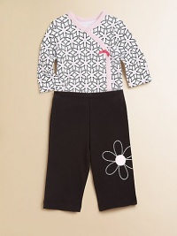 Bold, beautiful daisies adorn the bodysuit and pants of this plush cotton two-piece set with snaps and and elastic waistband. Bodysuit V-neckLong sleevesFront snapsBottom snaps Pants Elastic waistbandCuffed hemCottonMachine washImported Please note: Number of buttons/snaps may vary depending on size ordered. Bold, beautiful daisies adorn the bodysuit and pants of this plush cotton two-piece set with snaps and and elastic waistband. Bodysuit V-neckLong sleevesFront snapsBottom snaps Pants Elastic waistbandCuffed hemCottonMachine washImported Please note: Number of buttons/snaps may vary depending on size ordered.