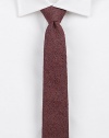 A traditional touch with modern characteristics, designed and crafted from supremely soft wool with a speckled melange finish.About 2½ wideWoolDry cleanImported