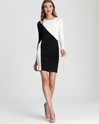 Go graphic with Alice + Olivia's monochromatic statement dress boasting a chic shoulder cut-out. Go graphic with Alice + Olivia's monochromatic statement dress boasting a chic shoulder cut-out.