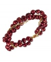 Go for a subtle hint of color. This beautiful bracelet features cranberry-colored cultured freshwater pearls (6-7 mm) set in 18k gold over sterling silver. Approximate length: 7-1/2 inches.