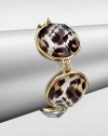 Let your true animal out with this leopard printed style. Epoxy14k goldplated brassLength, about 8.5Hinged closureImported 