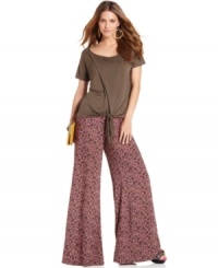 With a retro '90s appeal, these RACHEL Rachel Roy printed palazzo pants are perfect for a fashion-forward look -- be sure to elevate them with platforms! With a retro '90s appeal, these RACHEL Rachel Roy printed palazzo pants are perfect for a fashion-forward look -- be sure to elevate them with platforms!