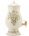 A perfect host for punch, water or mulled wine, this porcelain beverage dispenser is trimmed with green and a holly motif to match the beloved Lenox Holiday dinnerware collection.