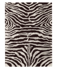 Exotic designs will be the pride of your decor. Adorned with zebra stripes in black and white, this Nourison rug has a marvelously soft and shaggy pile that's hand-tufted from premium-quality yarns. Beautiful in appearance and plush underfoot, this area rug creates an atmosphere of casual elegance. (Clearance) Exotic designs will be the pride of your decor. Adorned with zebra stripes in black and white, this Nourison rug has a marvelously soft and shaggy pile that's hand-tufted from premium-quality yarns. Beautiful in appearance and plush underfoot, this area rug creates an atmosphere of casual elegance. (Clearance)