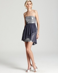 A ruffled chiffon skirt rests atop silver sequins on this strapless Aqua dress. Team with bow-detailed pumps to complete this girlish getup. A ruffled chiffon skirt rests atop silver sequins on this strapless Aqua dress. Team with bow-detailed pumps to complete this girlish getup.