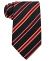 Mix work and play with multiple patterns on this silk tie from Sean John.