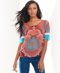Punch up your neutral bottoms with INC's short sleeve top, broadcasting a vibrant print! Punch up your neutral bottoms with INC's short sleeve top, broadcasting a vibrant print!