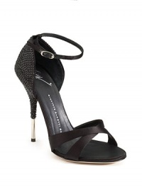 THE LOOKCrisscross strapsAnkle strap with buckle closureRhinestone studded heel with metal tipTHE FITHeel 4½ (115mm)THE MATERIALSatin upperMetal heelLeather lining and soleORIGINMade in Italy THE LOOKCrisscross strapsAnkle strap with buckle closureRhinestone studded heel with metal tipTHE FITHeel 4½ (115mm)THE MATERIALSatin upperMetal heelLeather lining and soleORIGINMade in Italy