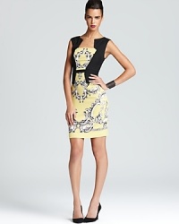 A fitted sheath silhouette takes on a paisley print and a modern asymmetric neckline. From BCBGMAXAZRIA. A fitted sheath silhouette takes on a paisley print and a modern asymmetric neckline. From BCBGMAXAZRIA.