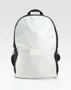 Lightweight carryall, crafted in a sleek color block design of packable polyester with leather logo accent patch.Zip closureTop handleInterior pocket12W x 18½H x 4DImported