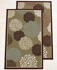 Beauty in bloom. A stylish floral motif flourishes thanks to the rich, earthy hues and plush nap of this alluring accent rug from Bacova. A latex back ensures non-slip protection. Beauty in bloom. A stylish floral motif flourishes thanks to the rich, earthy hues and plush nap of this alluring accent rug from Bacova. A latex back ensures non-slip protection.