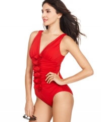 INC International Concepts' swimsuit offers tummy control draped in ruching and elegant ruffles. Wear with oversized sunglasses for a vintage-inspired, glamorous look! INC International Concepts' swimsuit offers tummy control draped in ruching and elegant ruffles. Wear with oversized sunglasses for a vintage-inspired, glamorous look!
