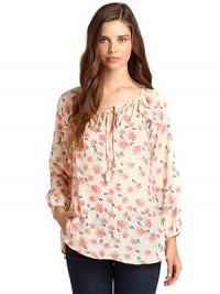 THE LOOKAllover floral printRuffle detailsFront V-slit with tie closureLong sleeves with vent in cuffs and button closureTHE FITAbout 24 from shoulder to hemTHE MATERIALPolyesterCARE & ORIGINDry cleanImportedModel shown is 5'10½ (179cm) wearing US size Small. THE LOOKAllover floral printRuffle detailsFront V-slit with tie closureLong sleeves with vent in cuffs and button closureTHE FITAbout 24 from shoulder to hemTHE MATERIALPolyesterCARE & ORIGINDry cleanImportedModel shown is 5'10½ (179cm) wearing US size Small.