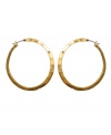 Hammered hoops make every day edgier. Kenneth Cole New York reinvents a classic with iridescent goldtone mixed metal and crystal accents. Approximate diameter: 3/4 inch.