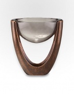 Forget the coaster or trivet: this ingenious design features a bronze-finish alloy structure that holds a glass bowl in mid-air suspension. From the Heritage Pebble CollectionAntique copper-plated alloy with glass plates11W X 6 H X 12DHand wash Imported