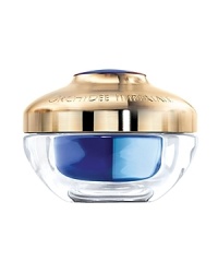 After seven years of intensive research, Guerlain discovered the secret to the orchid's longevity, the Orchidée Impériale molecular extract. Already working wonders on the face in the form of the ultra-luxurious cream and fluid, the timeless secret of the orchid is now captured in an extraordinary eye and lip cream. The protective and regenerative benefits of the extract restore firmness, suppleness, density and hydration to these particularly delicate areas.Orchidée Impériale Eye and Lip Cream targets under-eye puffiness and dark circles with autofocus reflectors that light up the eye area. A tightening agent creates an instant rested look around the eyes. Crow's-feet are immediately smoothed. After seven years of intensive research, Guerlain discovered the secret to the orchid's longevity, the Orchidée Impériale molecular extract. Already working wonders on the face in the form of the ultra-luxurious cream and fluid, the timeless secret of the orchid is now captured in an extraordinary eye and lip cream. The protective and regenerative benefits of the extract restore firmness, suppleness, density and hydration to these particularly delicate areas.Orchidée Impériale Eye and Lip Cream targets under-eye puffiness and dark circles with autofocus reflectors that light up the eye area. A tightening agent creates an instant rested look around the eyes. Crow's-feet are immediately smoothed.