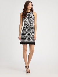 An exotic zebra print and a subtle ruffled hemline lend intrigue to this pullover silhouette.Jewel necklineSleevelessRuffled hemlineAbout 23 from natural waist48% viscose/43% wool/7% polyester/2% polyamideDry cleanMade in ItalyModel shown is 5'10 (177cm) wearing US size 4. An exotic zebra print and a subtle ruffled hemline lend intrigue to this pullover silhouette.Jewel necklineSleevelessRuffled hemlineAbout 23 from natural waist48% viscose/43% wool/7% polyester/2% polyamideDry cleanMade in ItalyModel shown is 5'10 (177cm) wearing US size 4.