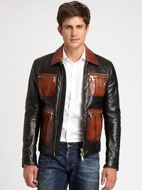 Two shades of supple leather, tailored in a bomber style and finished with bold zipper details.Point collarZip frontZipper patch pocketsZipper cuffsAbout 24 from shoudler to hemLeatherDry clean by leather specialistImported Two shades of supple leather, tailored in a bomber style and finished with bold zipper details.Point collarZip frontZipper patch pocketsZipper cuffsAbout 24 from shoudler to hemLeatherDry clean by leather specialistImported