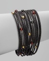 From the Black and Gold Chain Collection. Beautiful garnet, hematite and 18k gold beads accent this blackened sterling silver box chain design. Garnet, hematite and 18k gold beadsBlackened sterling silverLength, about 7½Push clasp closureImported 