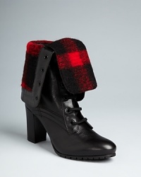 Burberry takes high fashion styling into the woods in these plaid-lined boots. Fold the cuffs over to show off the rich textile for a ruggedly chic weekend look; lace them up for a wear-to-work style. Burberry takes high fashion styling into the woods in these plaid-lined boots. Fold the cuffs over to show off the rich textile for a ruggedly chic weekend look; lace them up for a wear-to-work style.