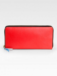 A sleek continental design with a vibrant leather exterior and multicolored inside panels.Zip closureOne inside snap pocketThree bill slotsSix credit card slotsLeather lining8W X 4H X 1D Imported A sleek continental design with a vibrant leather exterior and multicolored inside panels.Zip closureOne inside snap pocketThree bill slotsSix credit card slotsLeather lining8W X 4H X 1D Imported