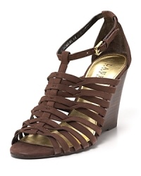 Inspired by gladiator silhouettes, the Damalise sandal from Lauren Ralph Lauren boasts a strappy vamp and wedge heel. Inspired by gladiator silhouettes, the Damalise sandal from Lauren Ralph Lauren boasts a strappy vamp and wedge heel.