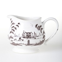 This charming Juliska creamer depicts a romantic scene from English country life in traditional ceramic stoneware. This charming Juliska creamer depicts a romantic scene from English country life in traditional ceramic stoneware.