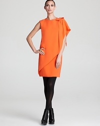Define modern design in this RAOUL dress featuring a stunning one-shoulder silhouette emboldened by an asymmetric cascading overlay. A playful bow lends a statement finish. Define modern design in this RAOUL dress featuring a stunning one-shoulder silhouette emboldened by an asymmetric cascading overlay. A playful bow lends a statement finish.