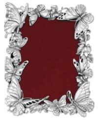 Make fond memories feel as fresh as spring with this silver-plated picture frame from Arthur Court. Sculpted butterflies gather around your favorite photos, turning each into a fanciful nature scene. Make fond memories feel as fresh as spring with this silver-plated picture frame from Arthur Court. Sculpted butterflies gather around your favorite photos, turning each into a fanciful nature scene.
