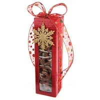 Beautifully wrapped in a holiday motif complete with a snowflake ornament, these chocolate-covered confections are a mouthwatering delight - perfect for gift giving. Beautifully wrapped in a holiday motif complete with a snowflake ornament, these chocolate-covered confections are a mouthwatering delight - perfect for gift giving.