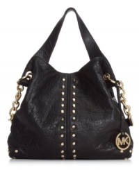 Elegance with attitude, this leather lovely from MICHAEL Michael Kors has a decidedly downtown vibe. Embellished with gleaming stud accents, chain-link detailing and signature hardware, it's the ultimate urban-cool accessory. Elegance with attitude, this leather lovely from MICHAEL Michael Kors has a decidedly downtown vibe. Embellished with gleaming stud accents, chain-link detailing and signature hardware, it's the ultimate urban-cool accessory.