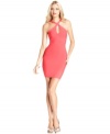 Body-con styling and a keyhole cutout adds sultry appeal to this BCBGMAXAZRIA mini dress for hot soiree style!