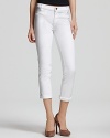 A cropped silhouette lends a chic twist to these crisp, clean MiH skinny jeans.