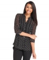 Charter Club's semi-sheer blouse features a graphic polka dot print. It's perfect with jeans and a tank top on casual days.