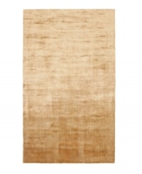 Presenting a rich, classic gold in soft viscose, the Beckett area rug from Lauren Ralph Lauren offers a chic ground ripe for enhancing any modern setting. Durable enough to withstand heavy indoor traffic, yet luxuriously soft underfoot. Presenting a rich, classic gold in soft viscose, the Beckett area rug from Lauren Ralph Lauren offers a chic ground ripe for enhancing any modern setting. Durable enough to withstand heavy indoor traffic, yet luxuriously soft underfoot.