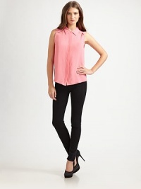 Woven crepe lightens this sleeveless essential styled with bound cutouts at the shoulder and back.Point collarSleevelessConcealed button-down placketShirttail hemAbout 26 from shoulder to hem55% viscose/45% rayonDry clean or hand washImportedModel shown is 5'9 (175cm) wearing US size 4. Woven crepe lightens this sleeveless essential styled with bound cutouts at the shoulder and back.Point collarSleevelessConcealed button-down placketShirttail hemAbout 26 from shoulder to hem55% viscose/45% rayonDry clean or hand washImportedModel shown is 5'9 (175cm) wearing US size 4.