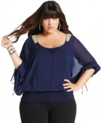 Toast the weekend in style with Baby Phat's three-quarter-sleeve plus size top, featuring embellished shoulders. Toast the weekend in style with Baby Phat's three-quarter-sleeve plus size top, featuring embellished shoulders.