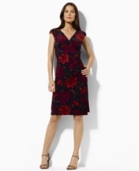 Fluid matte jersey drapes beautifully in a slinky, ruched silhouette featuring cap sleeves and a chic, crossover neckline, from Lauren by Ralph Lauren. (Clearance) Fluid matte jersey drapes beautifully in a slinky, ruched silhouette featuring cap sleeves and a chic, crossover neckline, from Lauren by Ralph Lauren. (Clearance)
