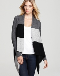 A soft layer to wrap yourself in all season, this divine new duster flaunts the season's color block trend in soft wool and cashmere. A soft layer to wrap yourself in all season, this divine new duster flaunts the season's color block trend in soft wool and cashmere.