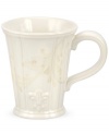 With embossed lilies and golden leaves, Portmeirion's decorated Fleur de Lys mug sets tables in the French tradition. Classic, fluted stoneware in warm ivory lends distinct old-world elegance to everyday dining.