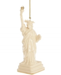 As statuesque as her inspiration, the Lady Liberty ornament welcomes guests to gather 'round. Her gold torch is radiant atop ivory porcelain with the esteemed craftsmanship of Lenox. As statuesque as her inspiration, the Lady Liberty ornament welcomes guests to gather 'round. Her gold torch is radiant atop ivory porcelain with the esteemed craftsmanship of Lenox.